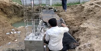 Excavated footing pit with column reinforcement cage